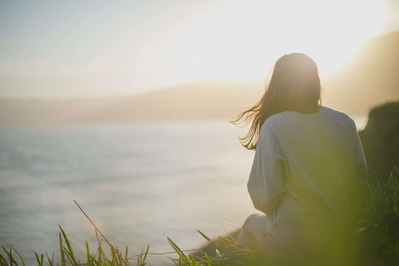 woman staring at ocean