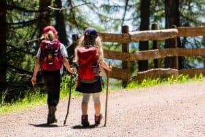 children hiking with personal space
