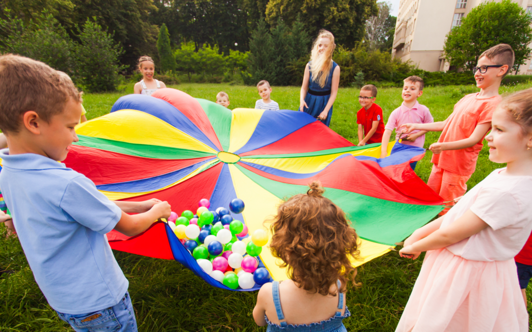 children playing with a parachute